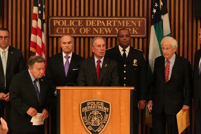 Mayor Bloomberg speaks against the Community Safety Act, flanked by Queens DA Richard Brown
